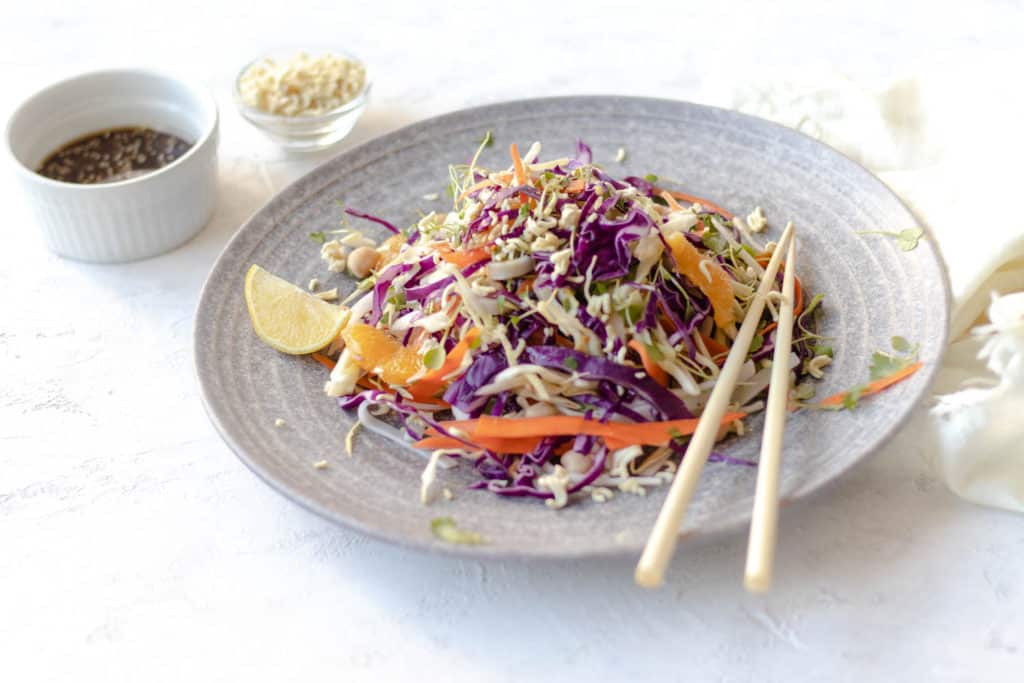 asian slaw in a grey plate