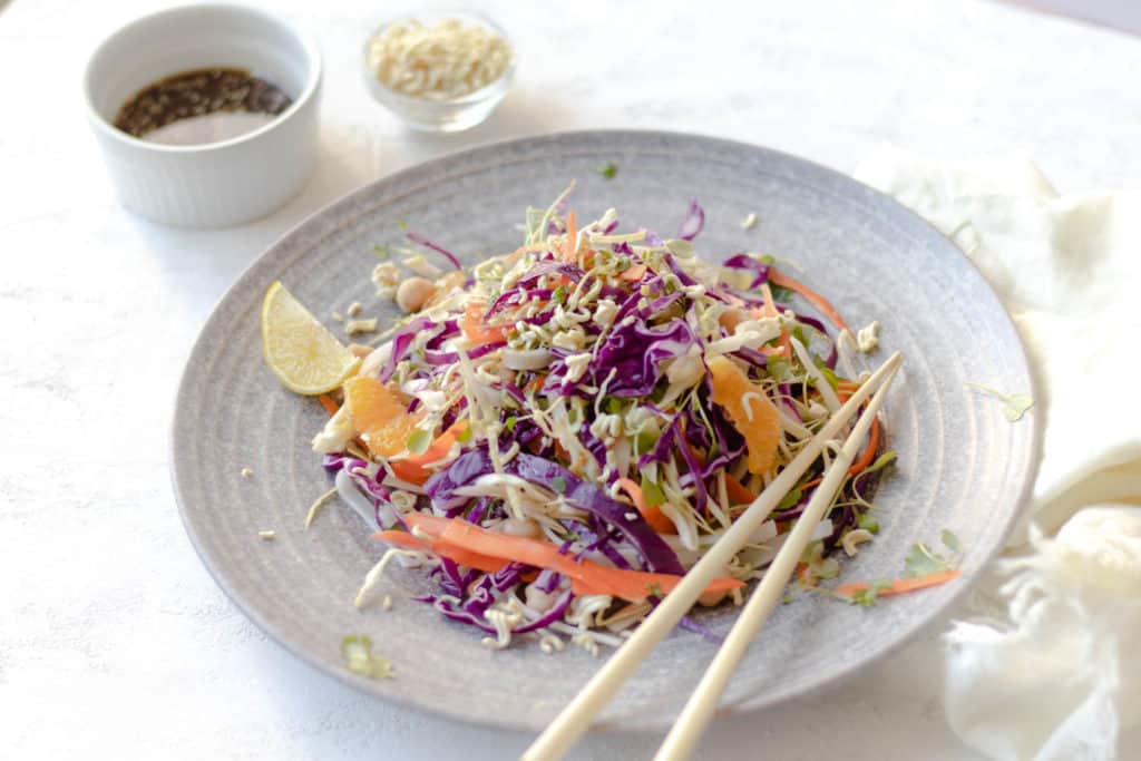 asian slaw salad with chopsticks