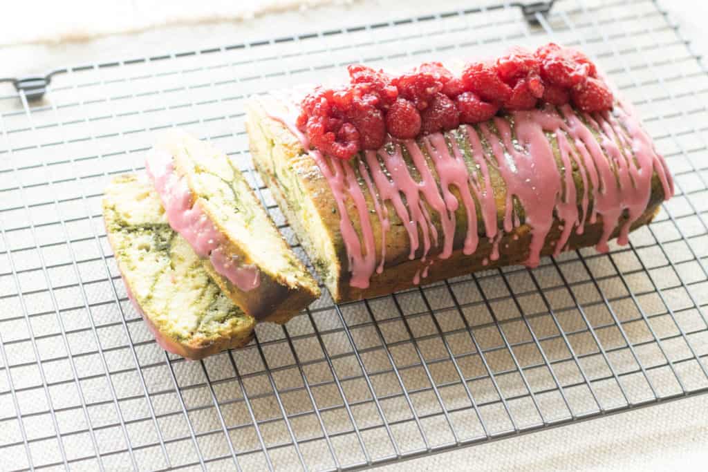 matcha lemon marble pound cake on a cooling rack
