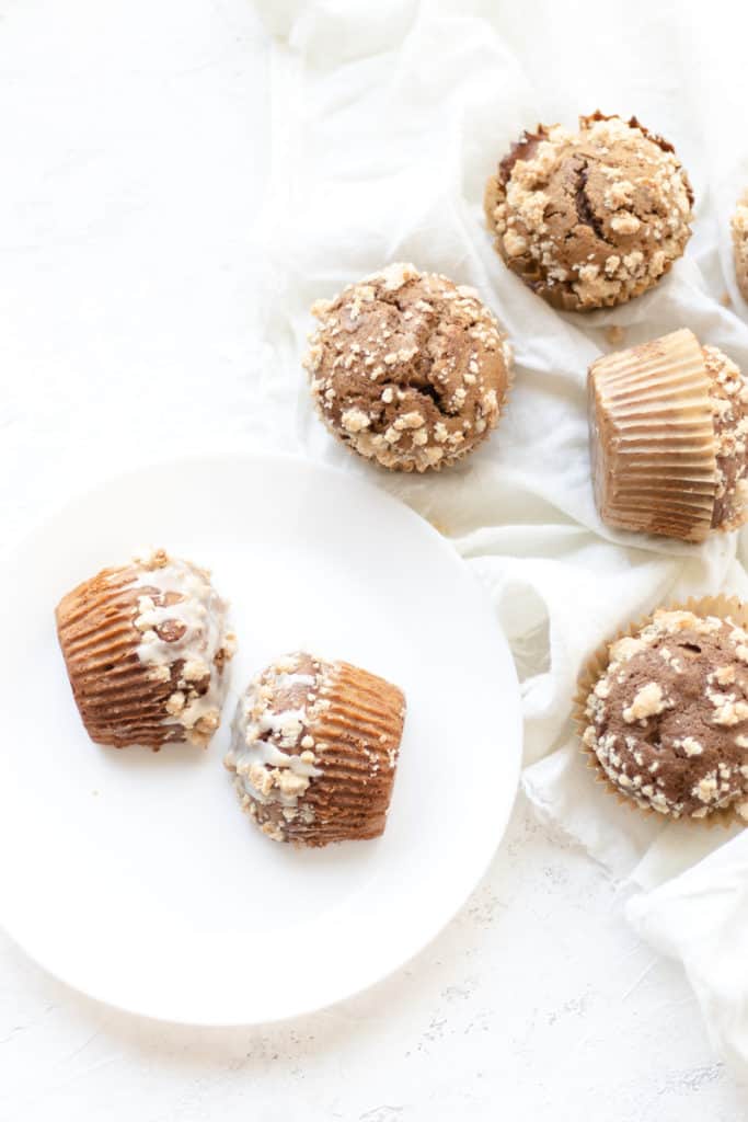 coffee cake muffin cut in half on a plate