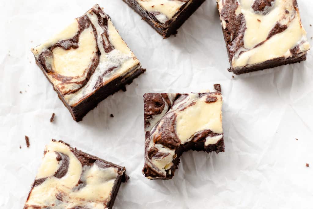 brownie with cream cheese swirl with a bite taken out of it