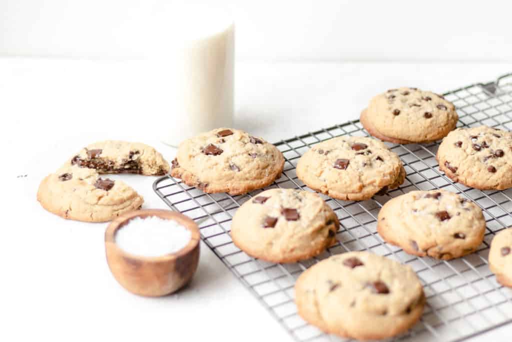 chocolate chip tahini cookies on a cooling rack
