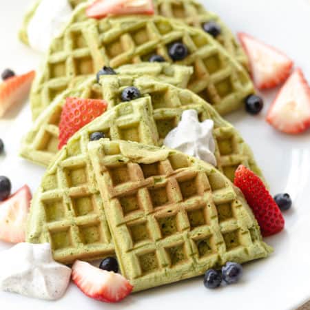 green tea matcha waffles with black sesame whipped cream and fruit