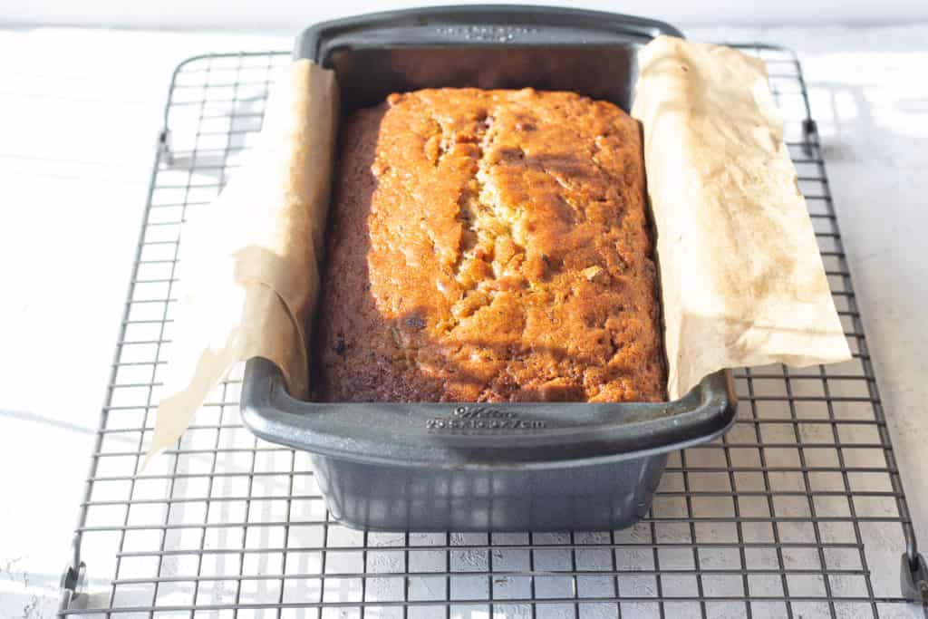 chocolate chip zucchini bread in parchment lined baking dish