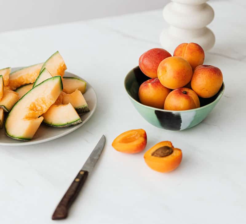 Canteloupe and apricots in a bowl