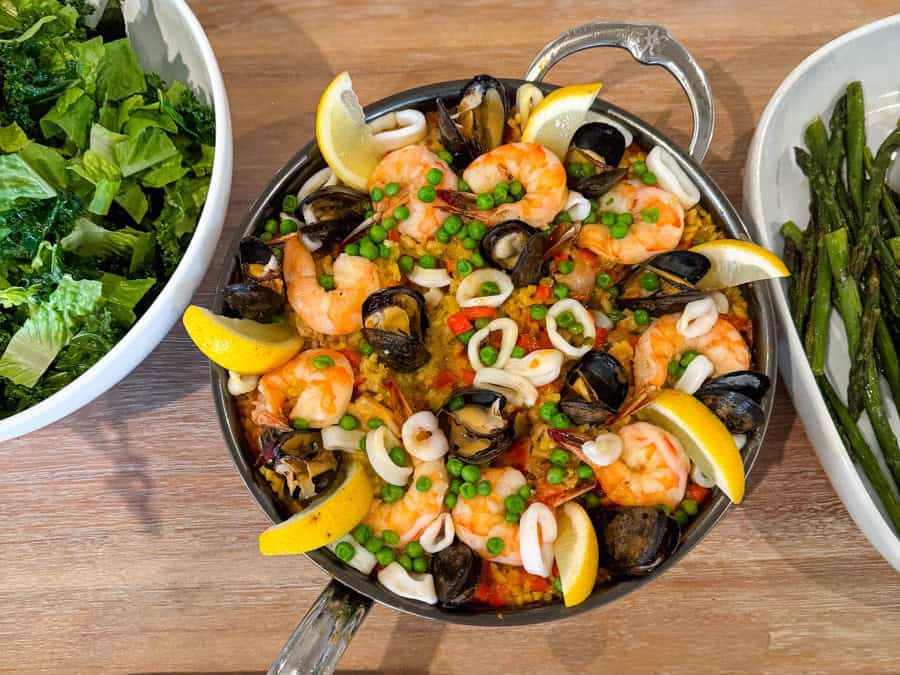 Paella in a pan on the dinner table