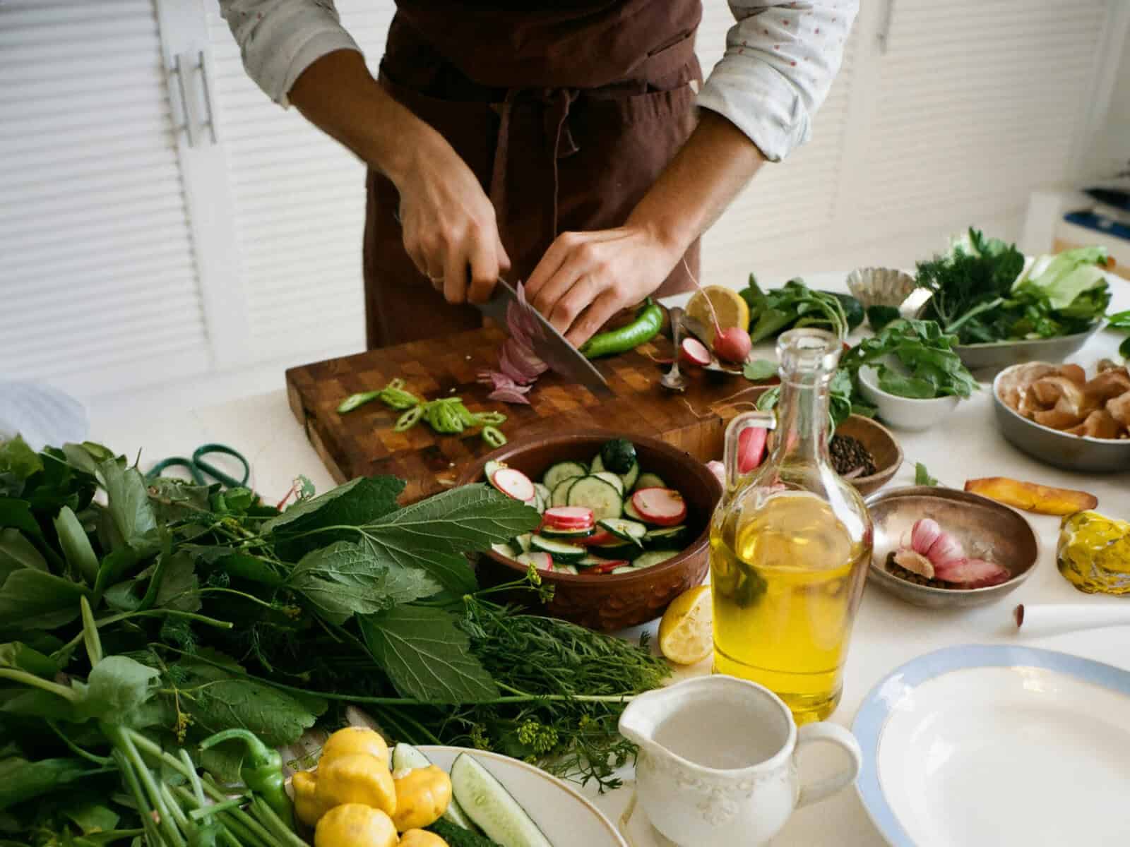 chef cutting fresh vegetables