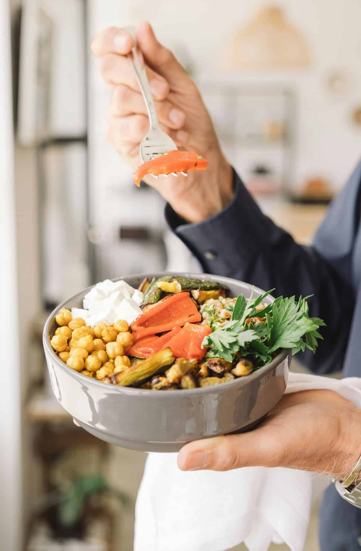 Personal chef services meal bowl with fresh chickpeas, roasted vegetables, and herbs