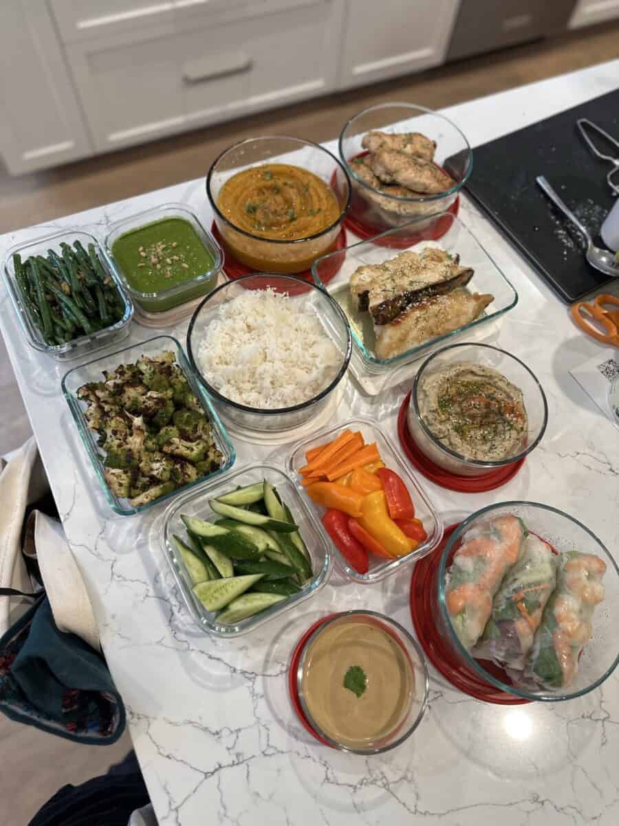 Summer rolls, roasted chicken and fish portioned into weekly containers by an Eats by Nicole chef