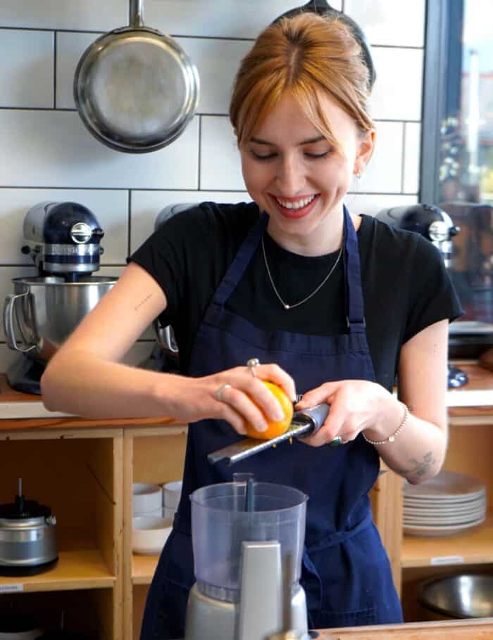 Chef Emmalee Abrams cooking in a client kitchen