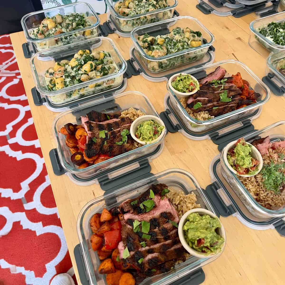 Steak fajita bowls with guacamole and creamy gnocchi, prepared as weekly meal prep